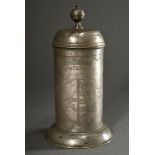 Pewter tankard in cylindrical form with wide flared base, domed hinged lid with spherical thumb res