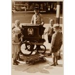 Schorer, Joseph (1894-1946) 'The organ grinder', photograph, mounted on cardboard, inscr. below, ve