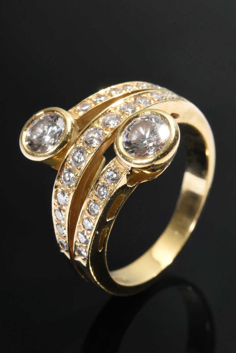 Gelbgold 750 Toi-et-Moi Wickelring mit Brillantbesatz (zus. ca. 1.10ct/VSI/W), 6,4g, Gr. 53