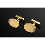 Pair of yellow gold 585 cufflinks with octagonal diamonds (total approx. 0.30ct/VSI/W) on an oval, 