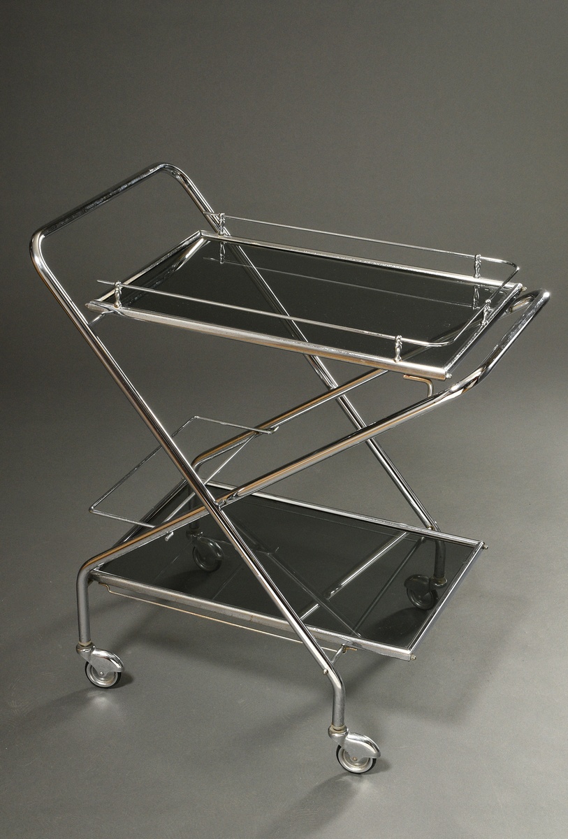 Folding tea trolley in Art Deco style with chrome-plated tubular steel scissor frame and two smoked