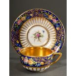 Magnificent demitasse cups/saucers with polychrome floral painting and pastose gold decoration on a