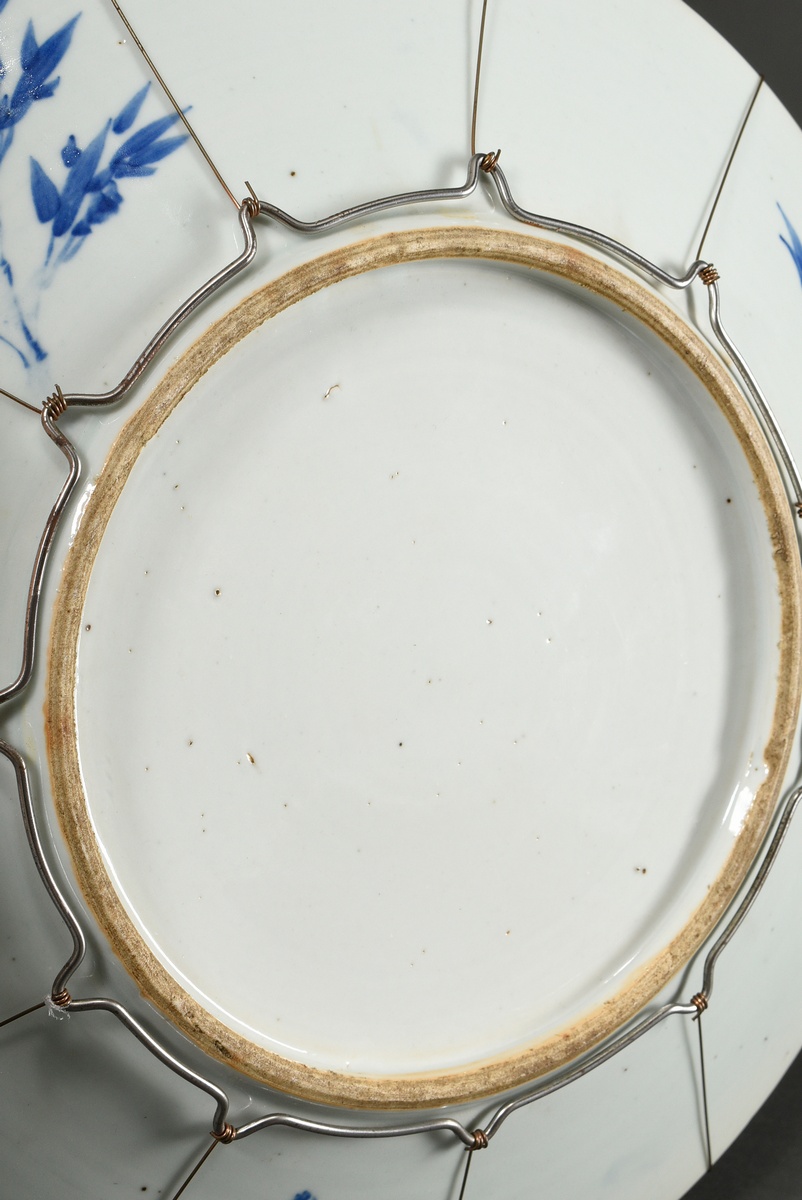 Round platter with rich blue-painted decoration "Two boys with vase on prunus branch background wit - Image 4 of 5