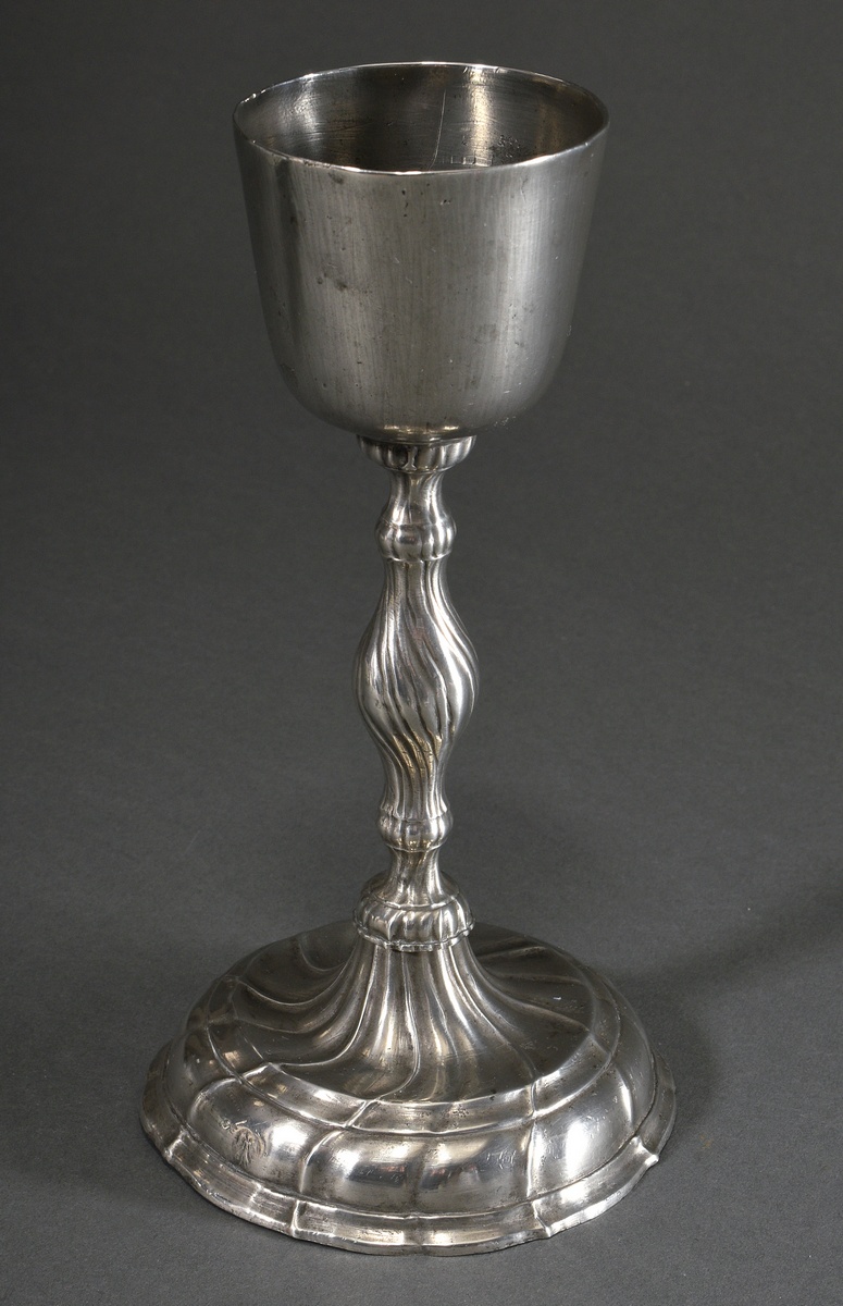 A pewter communion chalice with a simple bowl on a round foot with curved features, probably Mölln 