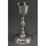 A pewter communion chalice with a simple bowl on a round foot with curved features, probably Mölln 