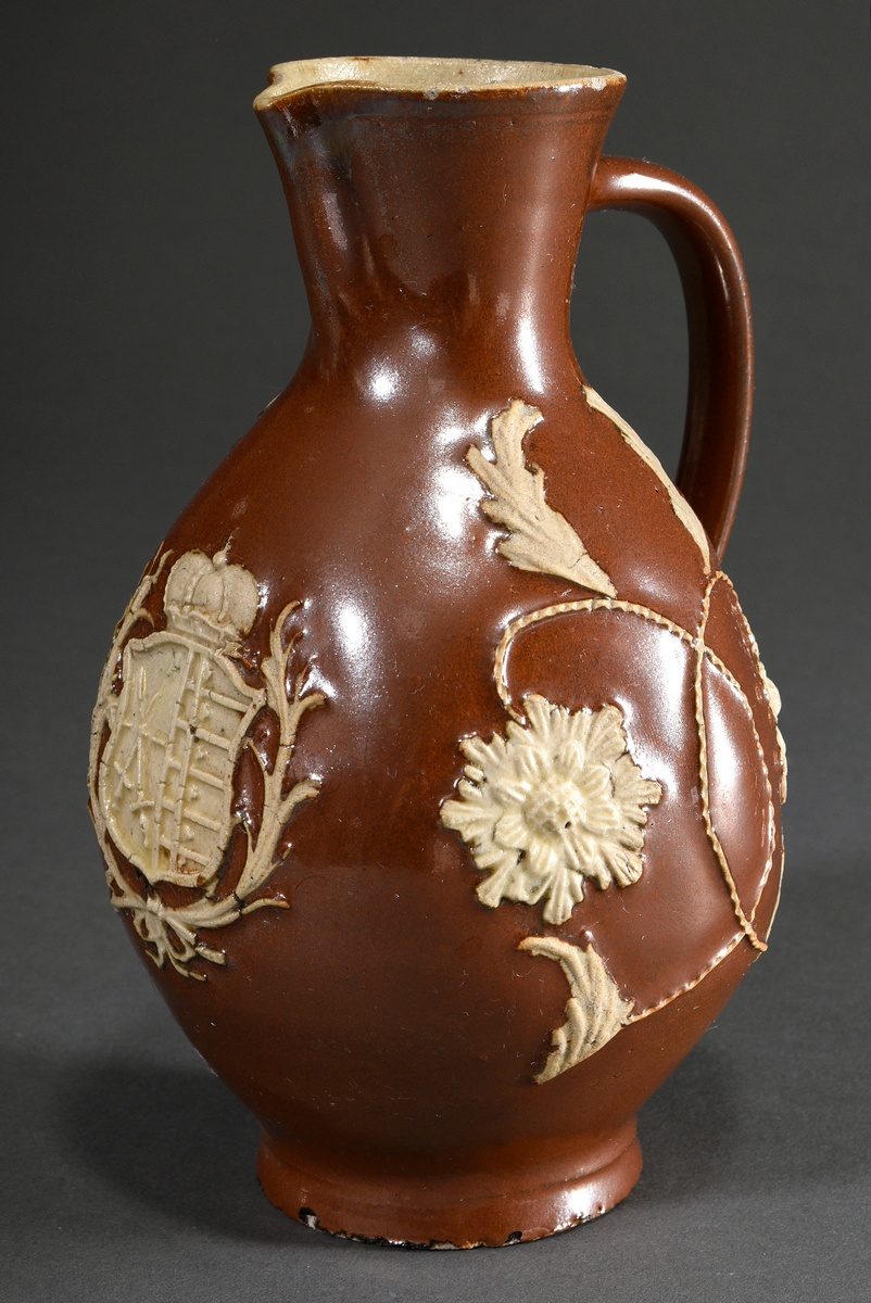 A large Bunzlau jug with Saxon coat of arms, egg shape over simple stand, funnel-shaped neck with p