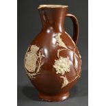 A large Bunzlau jug with Saxon coat of arms, egg shape over simple stand, funnel-shaped neck with p