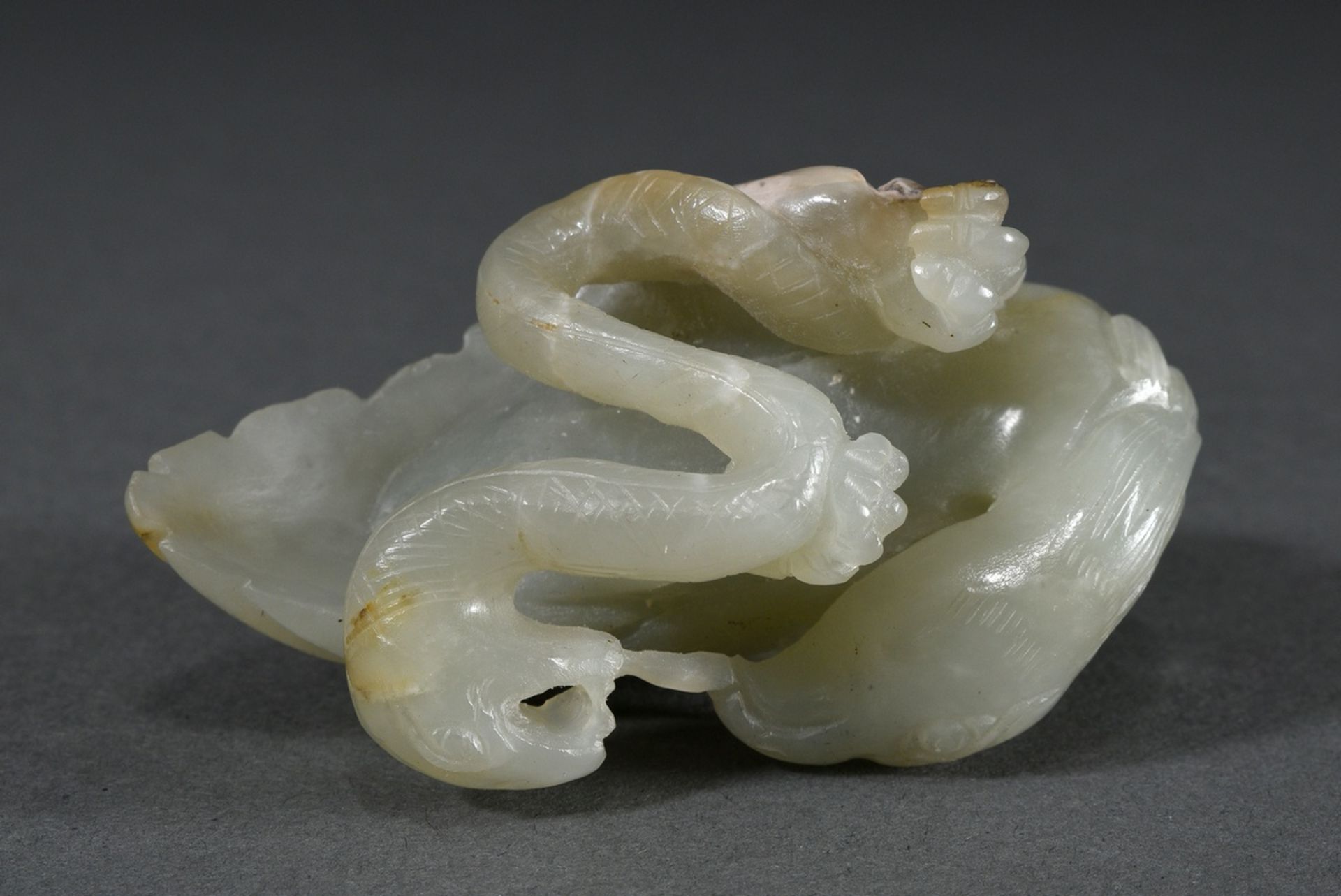 Finely carved celadon jade figure "Eagle and Snake" with rust colour, China Qianlong or later, l. 7 - Image 4 of 4