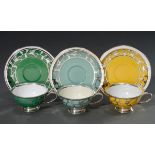 3 Various Rosenthal "Winifred" cups/saucer with floral silver overlay on blue, green and yellow gro
