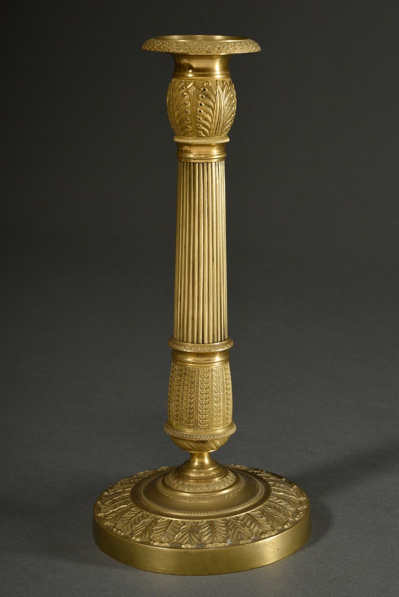 Empire column chandelier in gilt bronze with fluted shaft and leaf friezes on a round base, France,