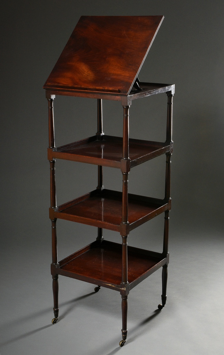 Decorative mahogany etagere on turned columns with castors and 4 shelves as well as an openable boo