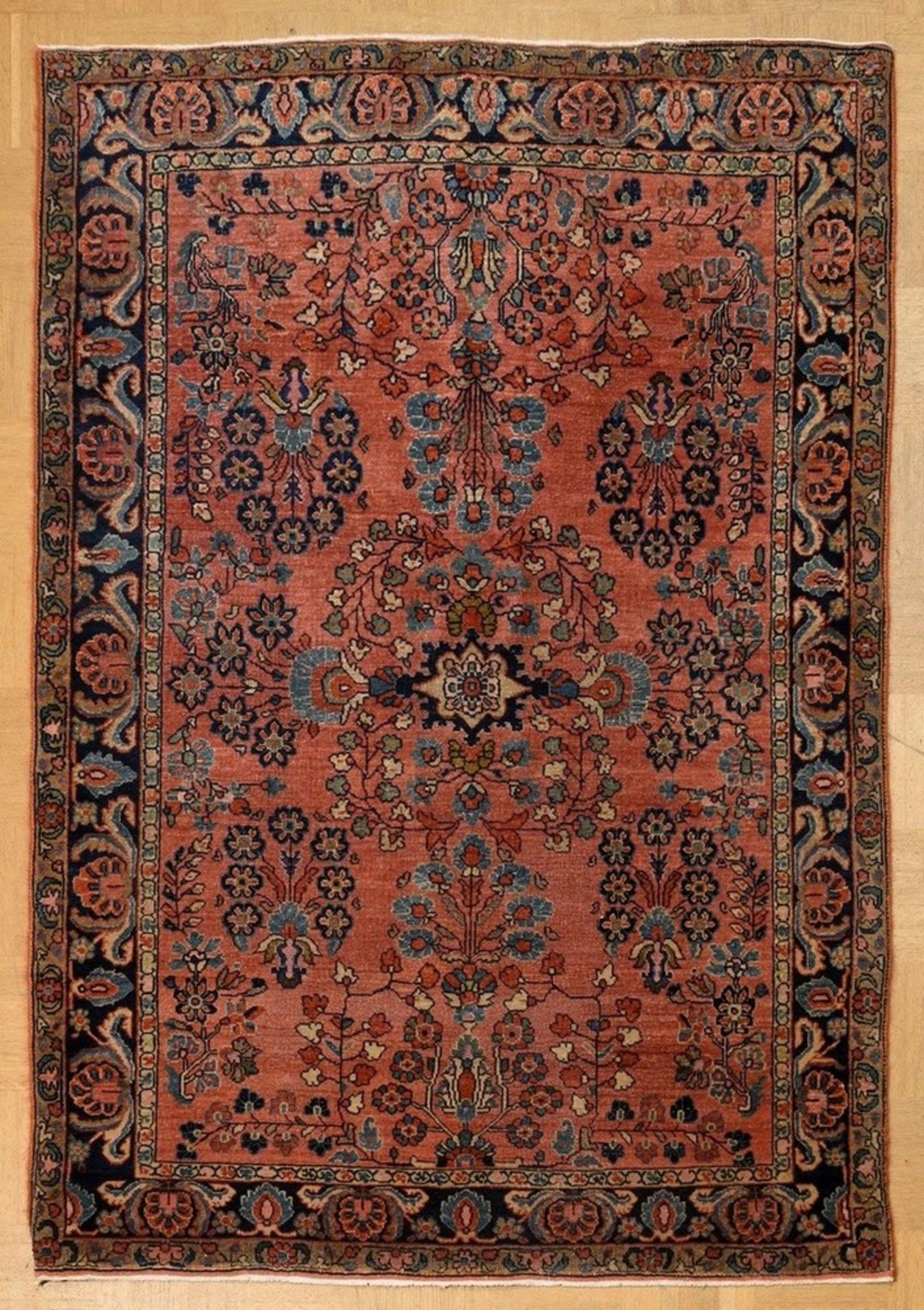 Sarough Lilihan with floral pattern on a light red field and ornamental main border on dark blue be - Image 2 of 7