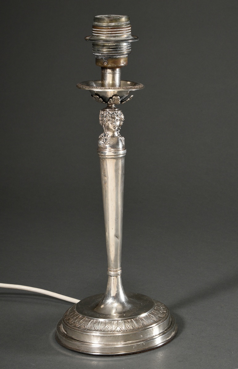 Empire chandelier with Janus head over a conical shaft and round base, early 19th century, mounted 