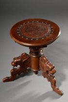 Swivelling historicism piano stool with leather upholstery and carved griffin heads, h. 49cm, Ø 54c