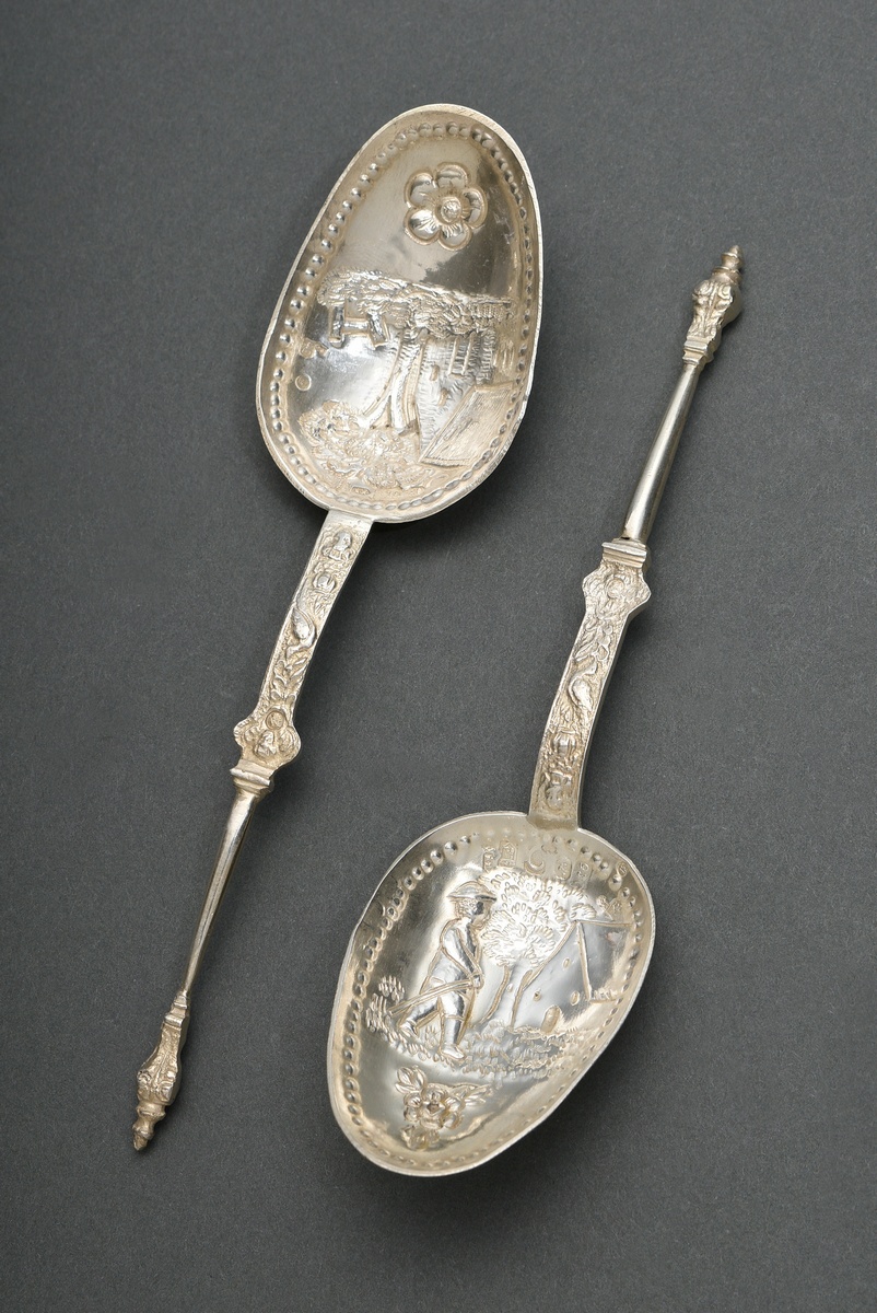 2 Dutch spoons with embossed decoration ‘Farmhouse and man’, Amsterdam, silver 930, 88g, l. 18cm