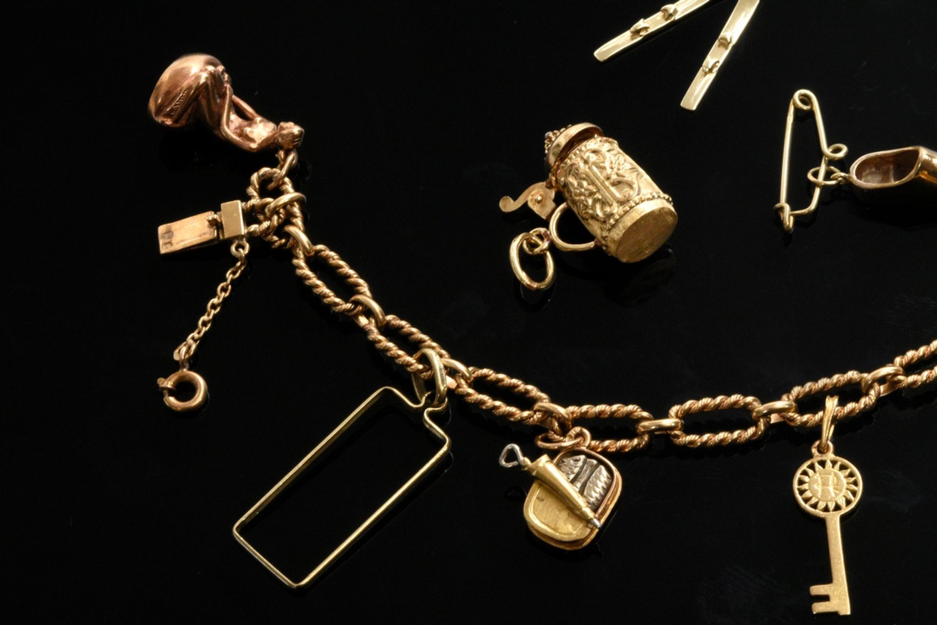 Classic yellow gold 800 charm bracelet with various pendants in different alloys: e.g. key, Eiffel  - Image 2 of 3