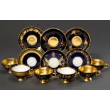6 Various moch cups/saucers with different floral gold decorations "tendrils" on a cobalt blue back
