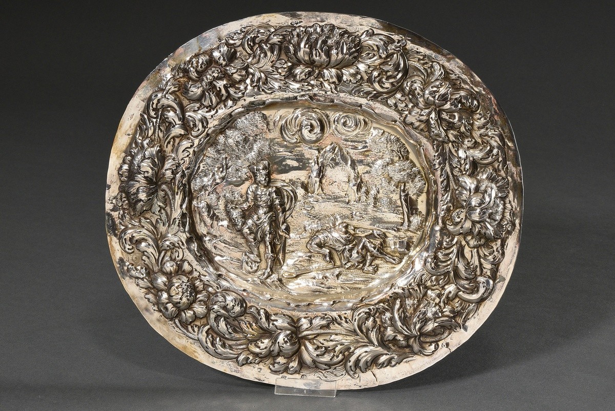 Oval Baroque display plate with embossed decoration "David with the head of Goliath in a wide lands