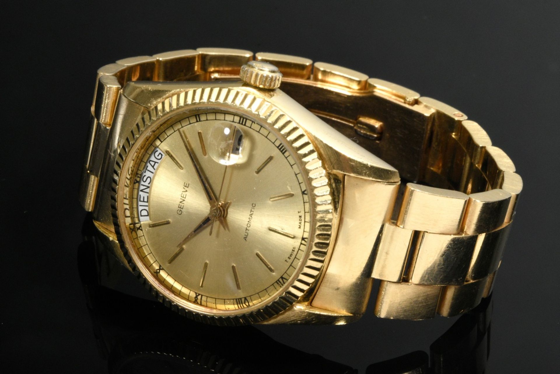 Yellow gold 750 Geneve wristwatch, automatic, line indices and Roman numerals, large second, day of