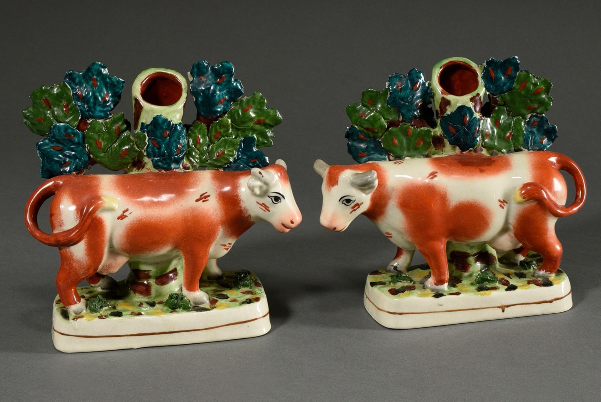 A pair of Staffordshire pendant groups ‘Cows’, soft porcelain polychrome painted, England 19th cent