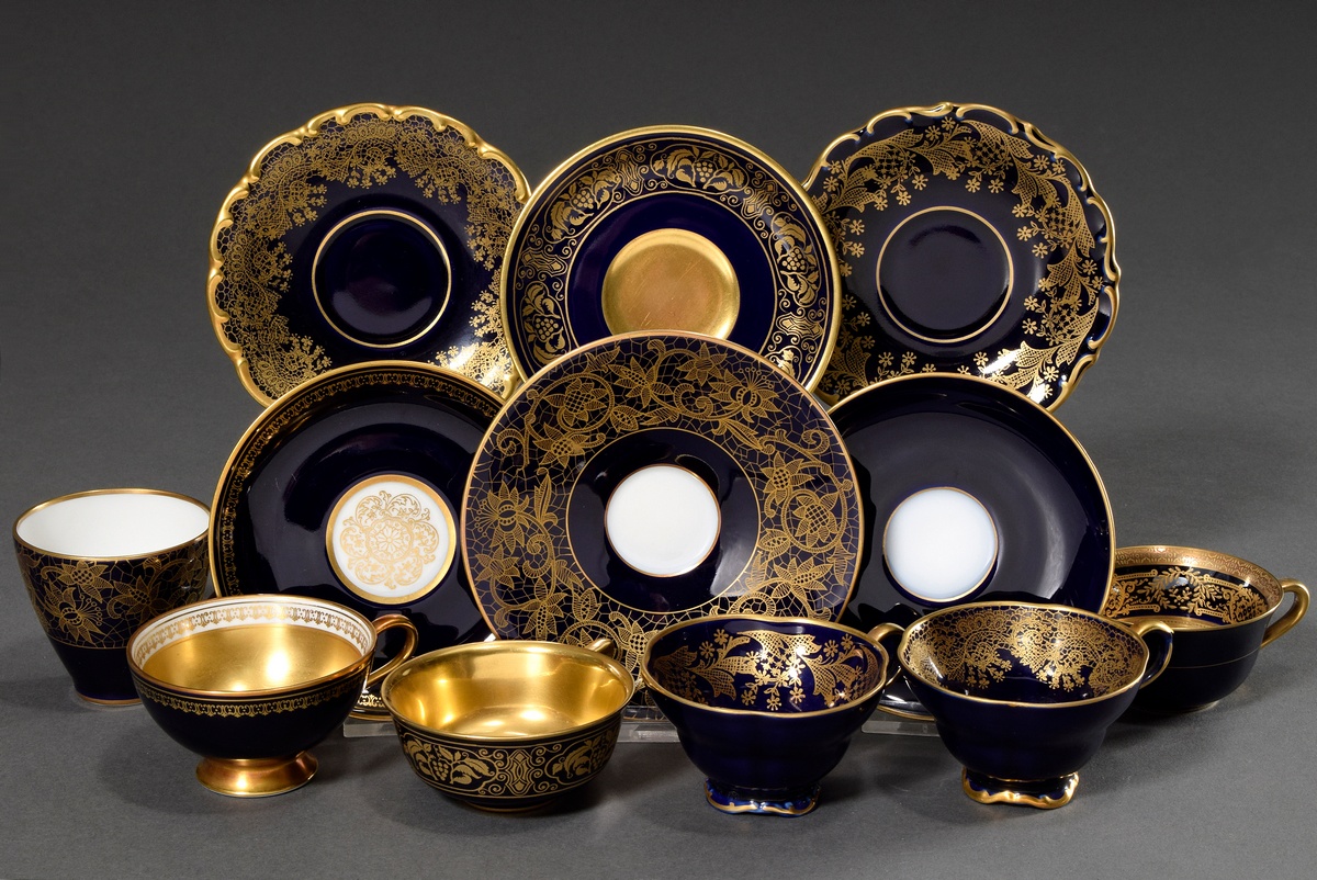 6 Various moch cups/saucers with different floral-ornamental gold decorations "tendrils" on a cobal