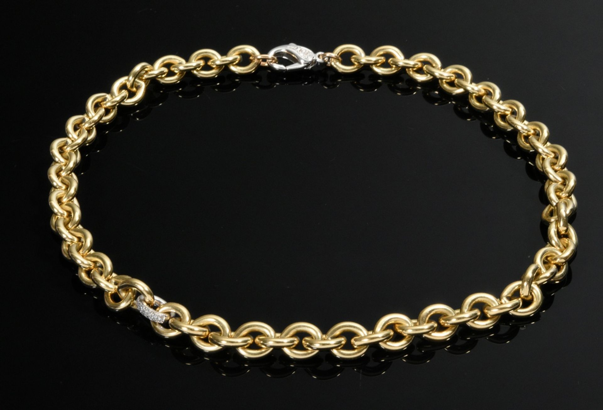 Heavy yellow gold 750 pea chain with white gold 750 intermediate element and lobster clasp in octag