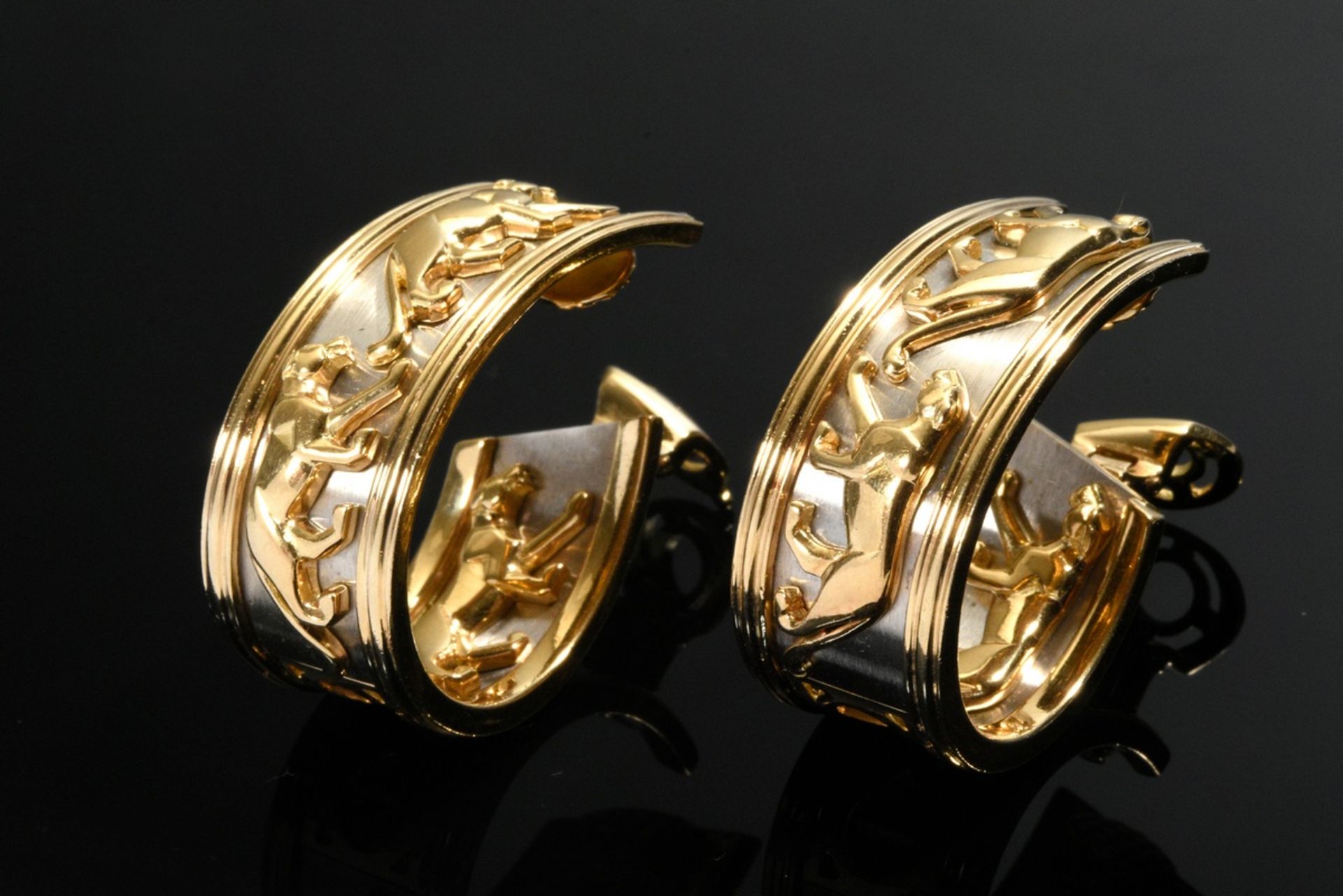 Pair of Cartier bicolor gold 750 hoop earrings "Walking Panther" with clip prism, signed and number