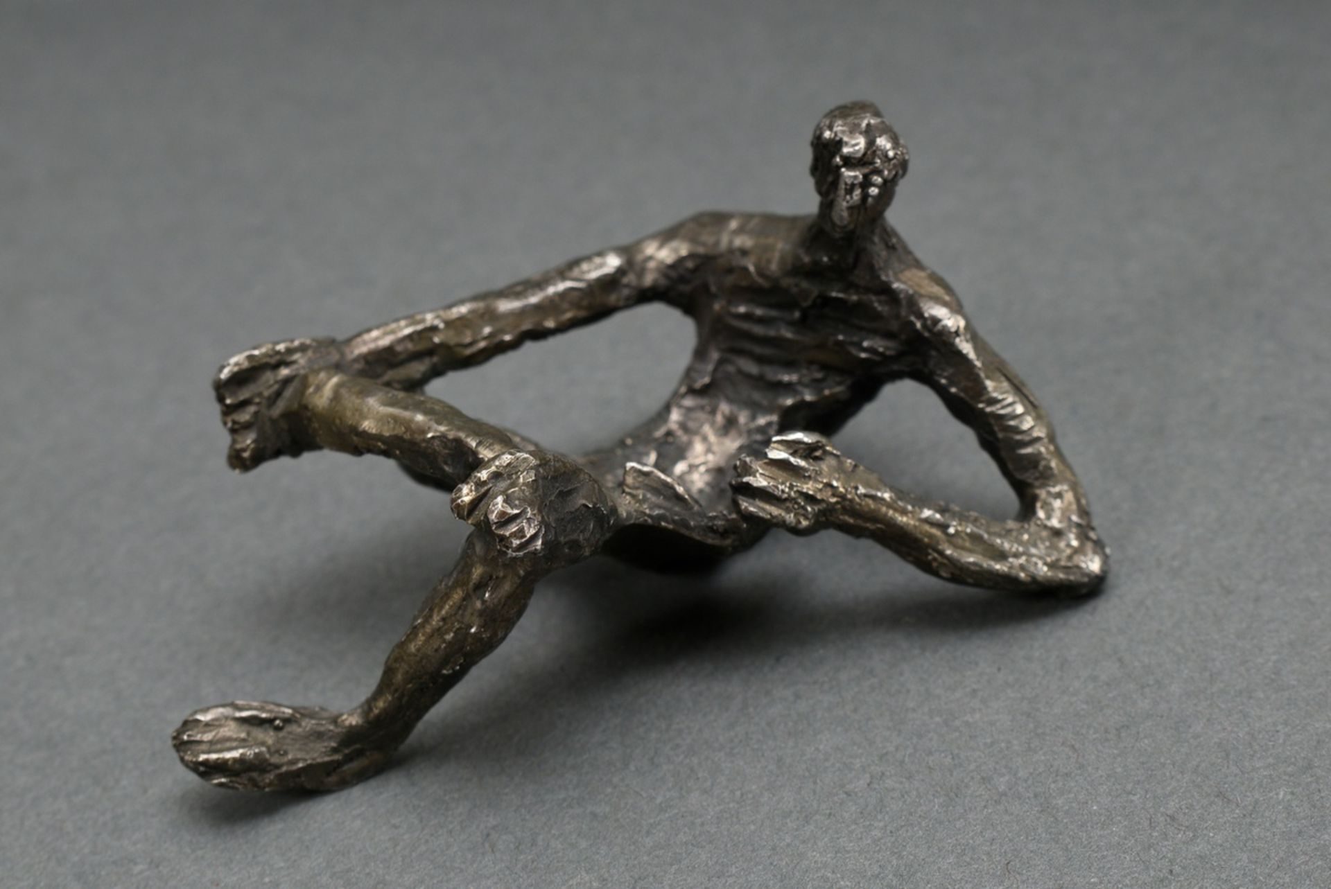 Reuter, Erich Fritz (1911-1997) "Reading Boy", monogr., silver 925, 57g, 3x6x4cm