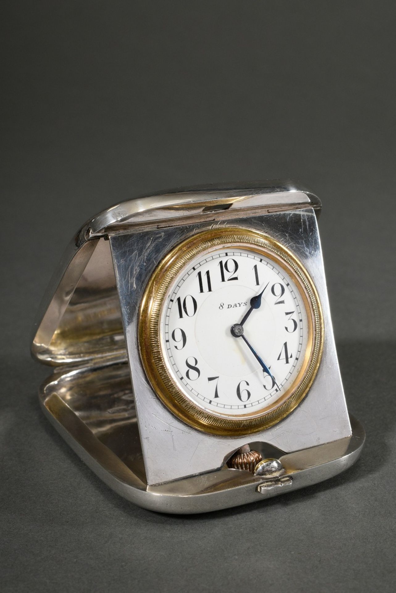 English travelling alarm clock in case, enamel dial with Roman numerals, MZ: E J Clewley & CO, Ches