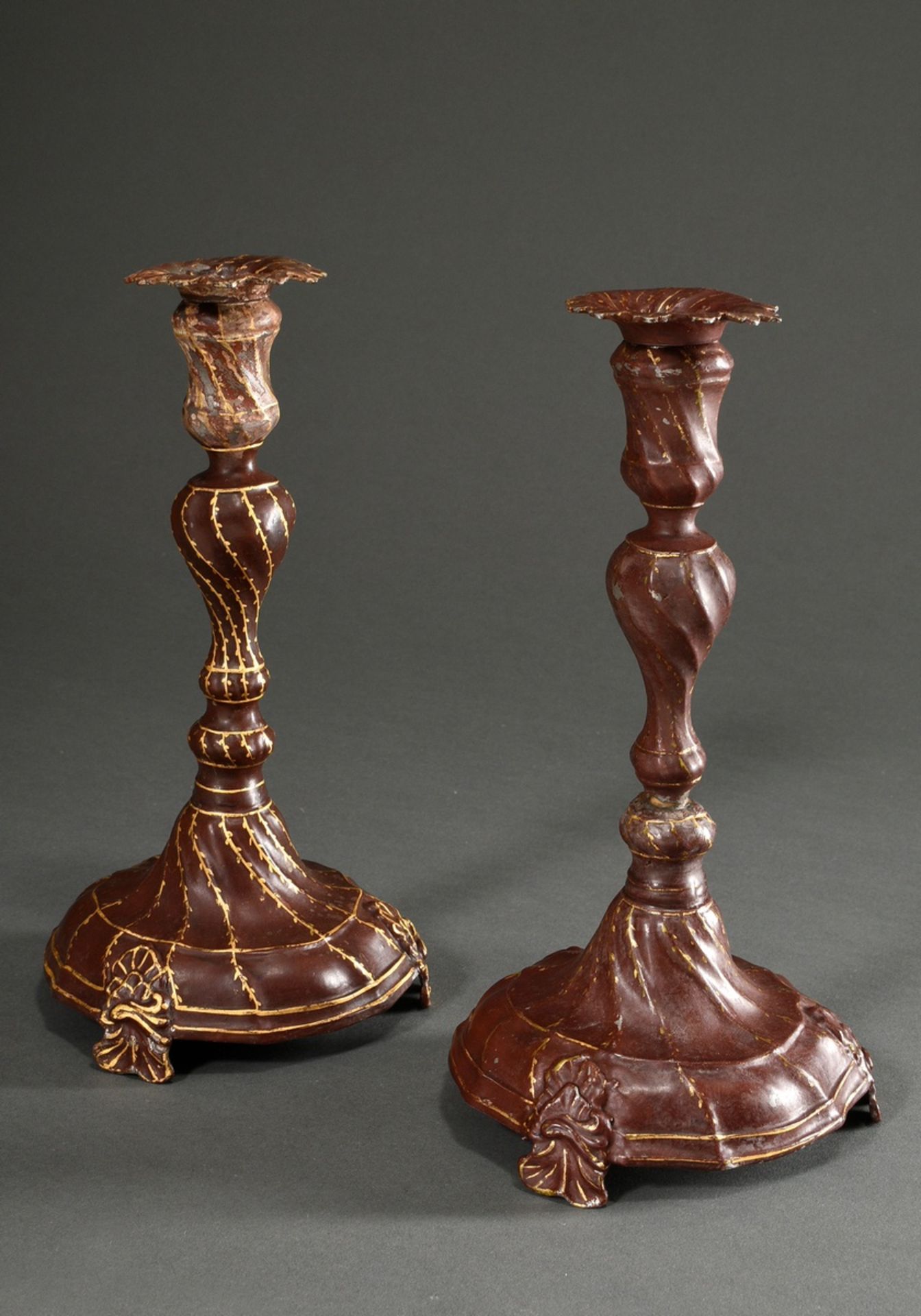 A pair of baroque pewter candlesticks with twisted features on a baluster shaft and bell foot over  - Image 2 of 5