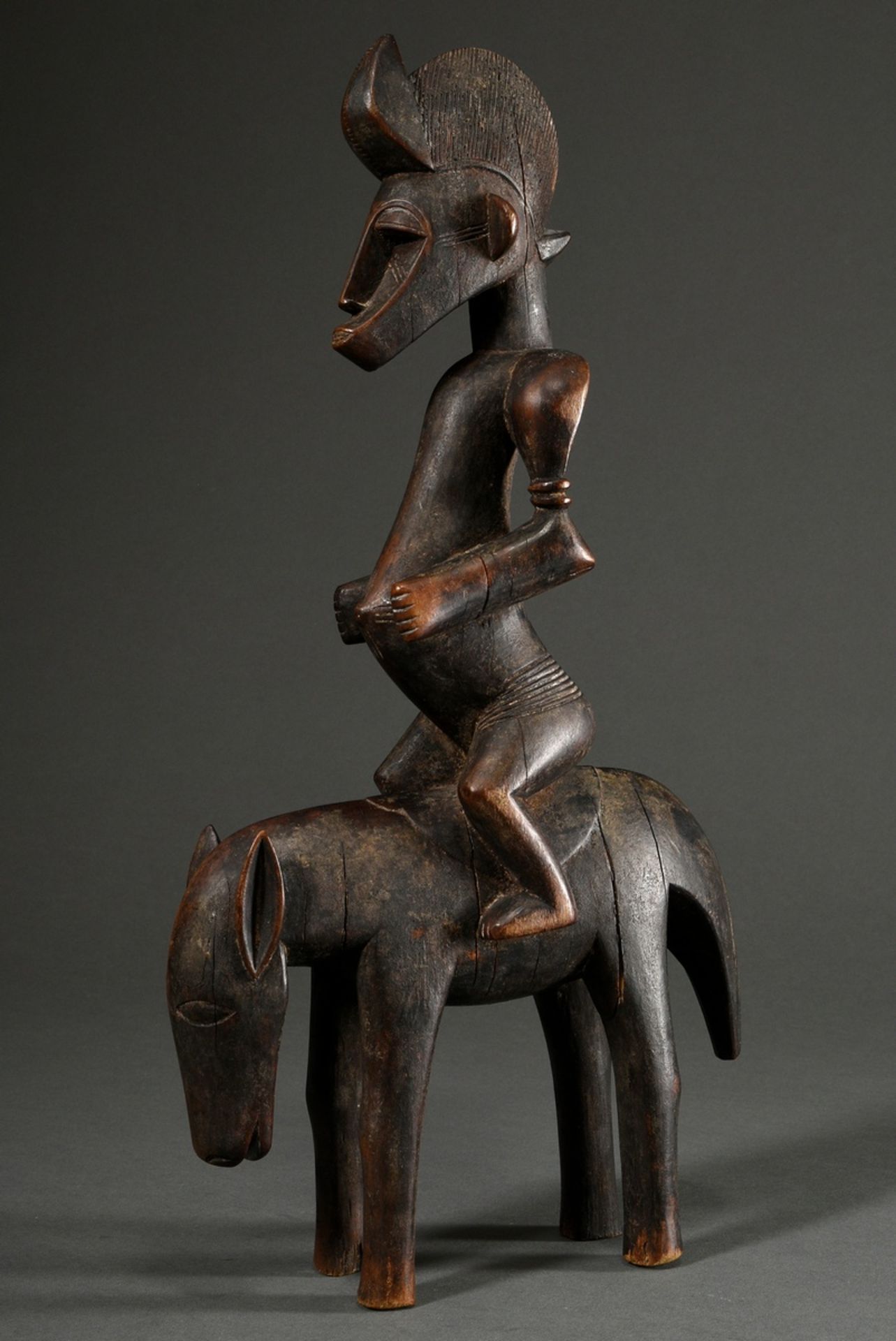 Reiter Figur im Stil der Senufo, West Afrika/ Elfenbeinküste, 2. Hälfte 20.Jh., H. 44cm, Alters- un