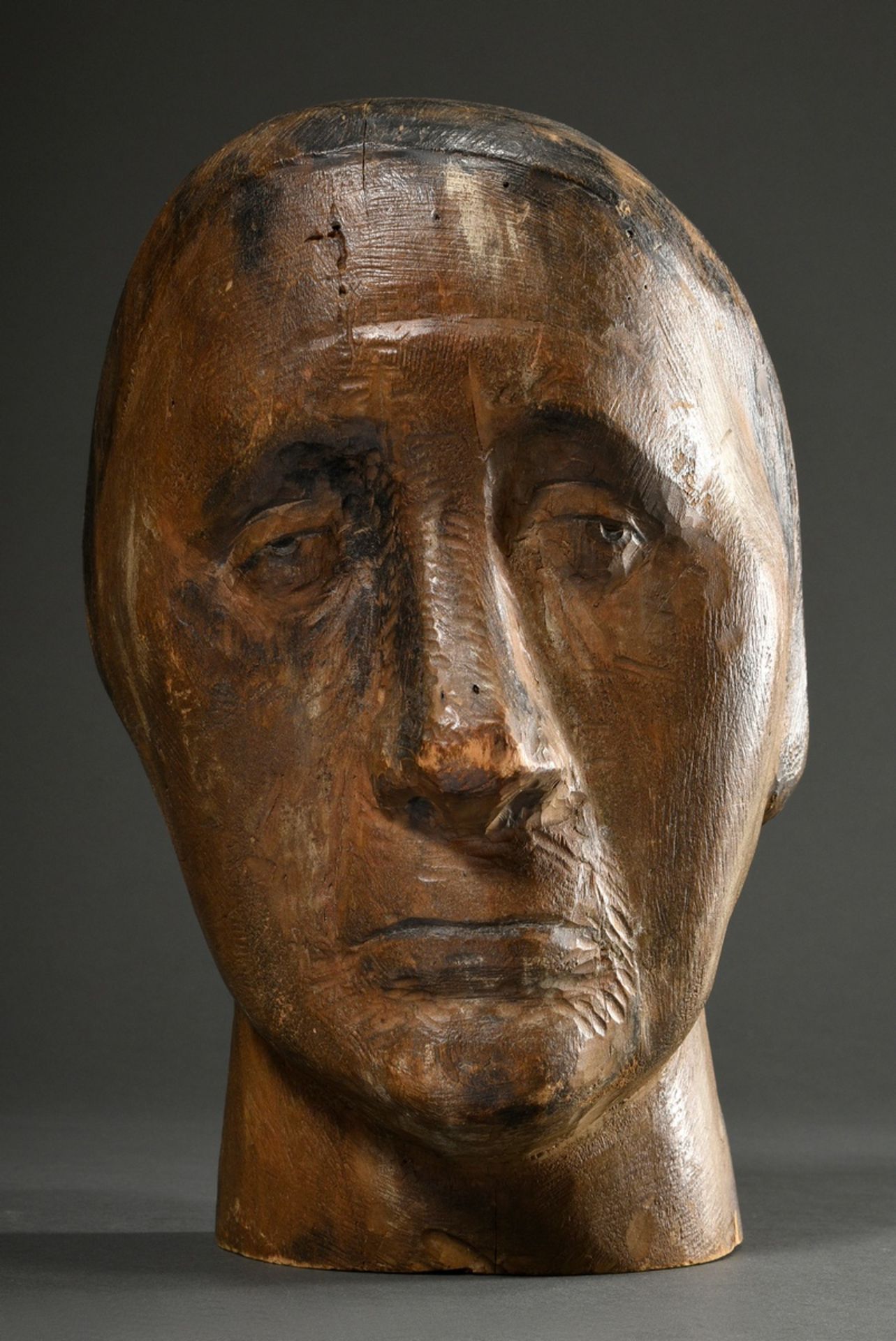 Large carved head "Old woman", wood with remnants of coloured paint, around 1920, 28x20x18cm, sligh