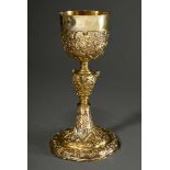 A Baroque communion chalice on a six-panelled foot with rich cartouche relief and 3 amorphous carto