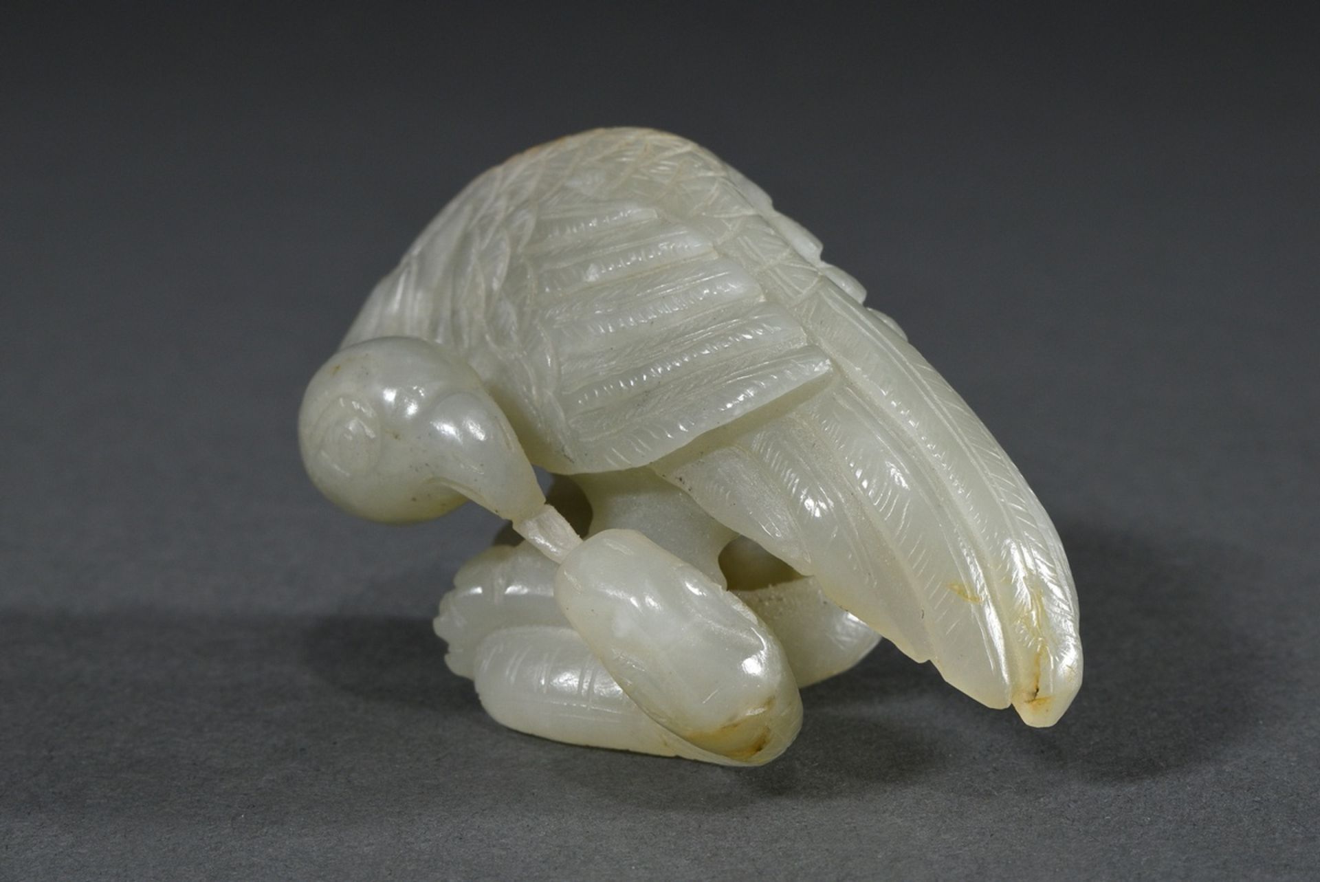 Finely carved celadon jade figure "Eagle and Snake" with rust colour, China Qianlong or later, l. 7 - Image 2 of 4