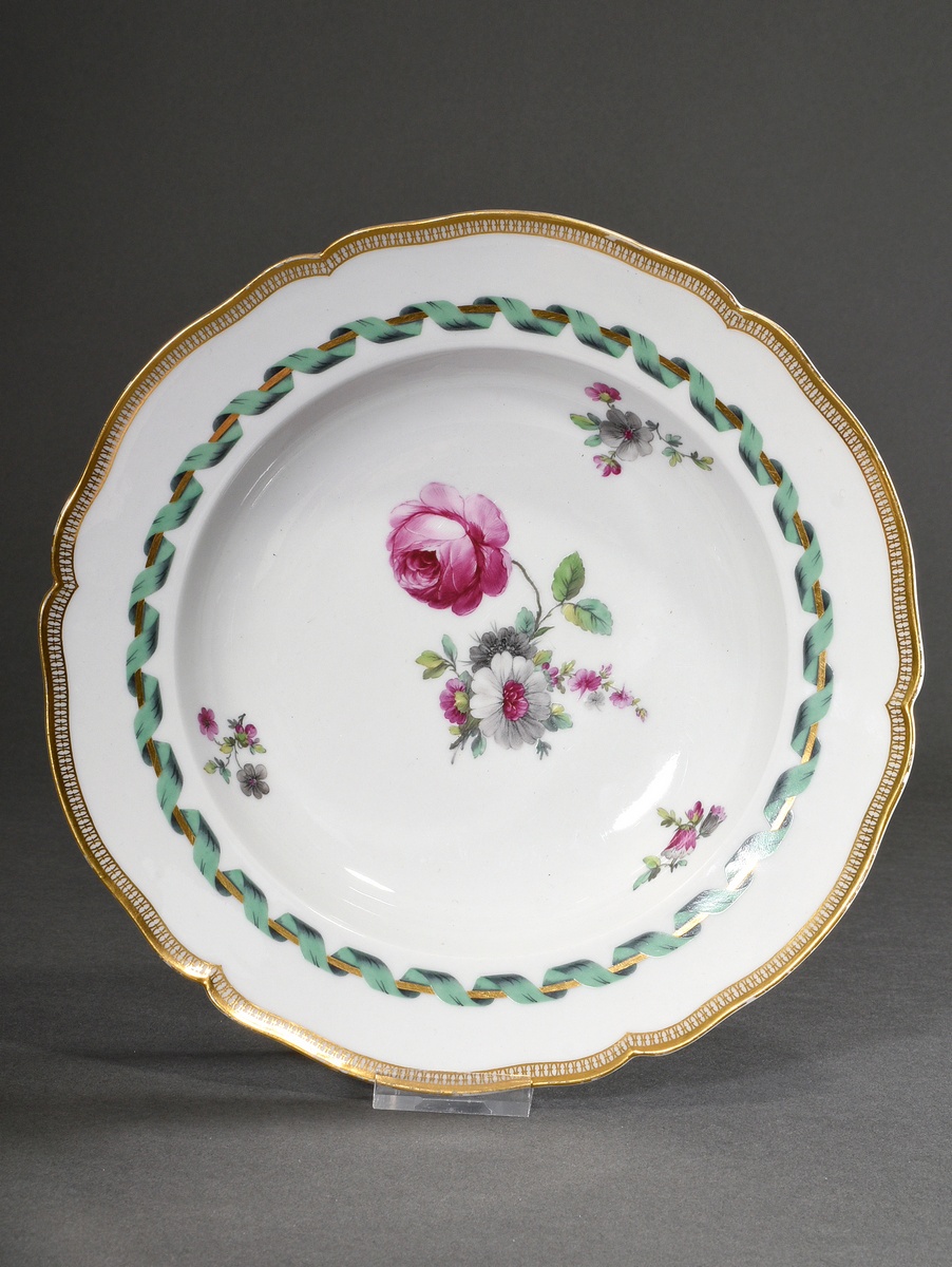 KPM soup plate with flower painting in purple, green and gray in the mirror as well as green band o