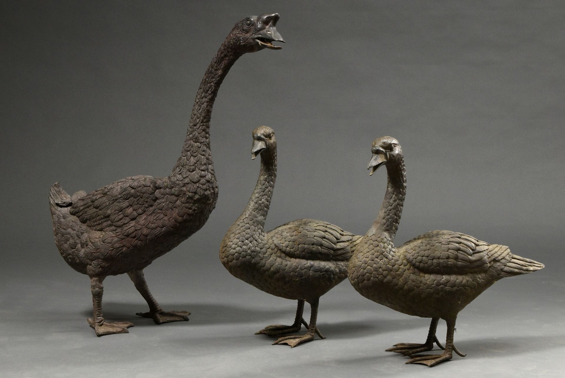 3 Bronze sculptures "Hump-backed swan with 2 young swans", h. 49/51/75cm, signs of age