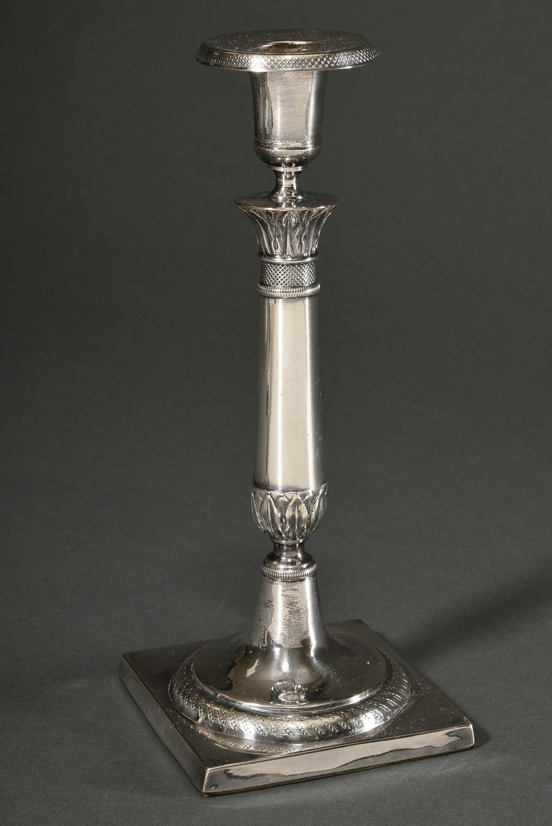 Berlin Empire candlestick on a square foot with a conical shaft and leaf and ornamental friezes, MM