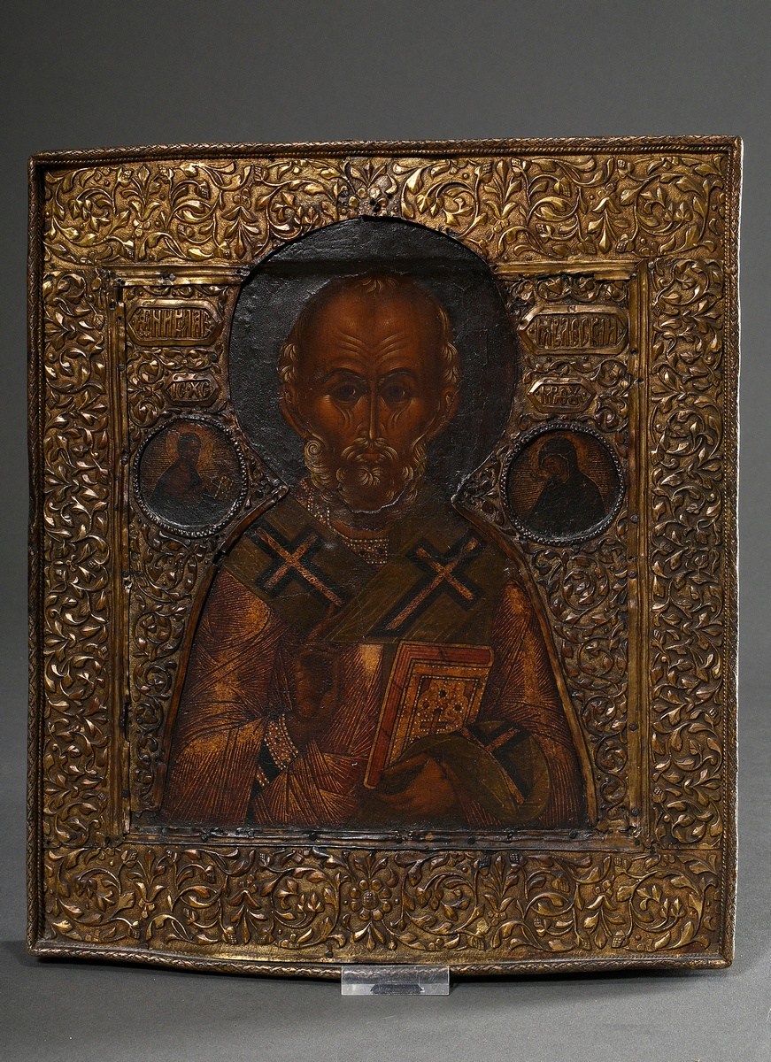 Russian icon "Saint Nicholas" under a florally embossed brass oklad, egg tempera/chalk ground on wo - Image 2 of 10