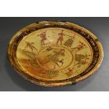 A very large Lower Rhenish potter's plate with incised decoration ‘Dancing couples and musicians’ a
