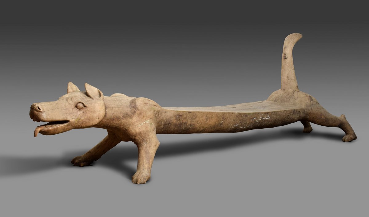 Indonesian chief's bench "Dog", carved from a trunk, Indonesia beginning of the 20th century, 350x4