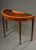 Elegant console table in semi-circular form on pointed legs with floral inlaid frame and fan motif 