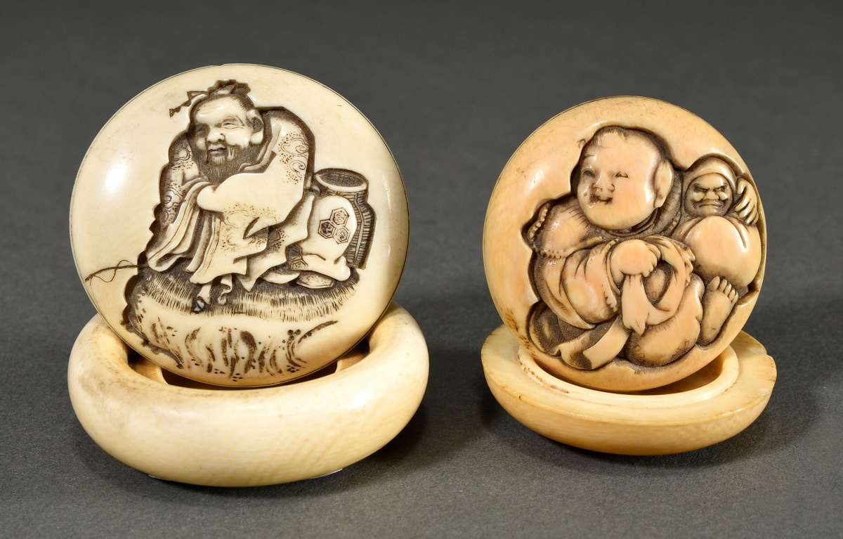 2 Various ivory manju netsuke with relief depictions, Japan, 2nd half 19th century: 1 "Karako with