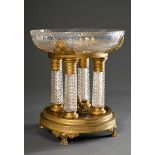 Opulent crystal centrepiece on 4 stone-cut columns with fire-gilt mounts in Empire style, France 19