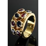 Wide yellow gold 585 ring irregularly set with rubies and sapphires, goldsmith's work, 11.6g, size 