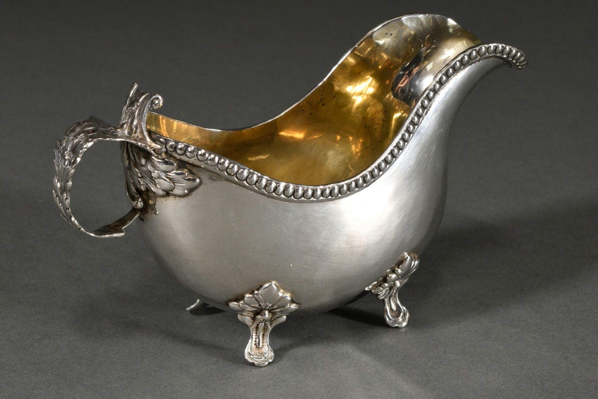 Small butter sauce boat with martelised body on 4 feet with beaded rim and leaf handle, Sweden, 1st - Image 2 of 6