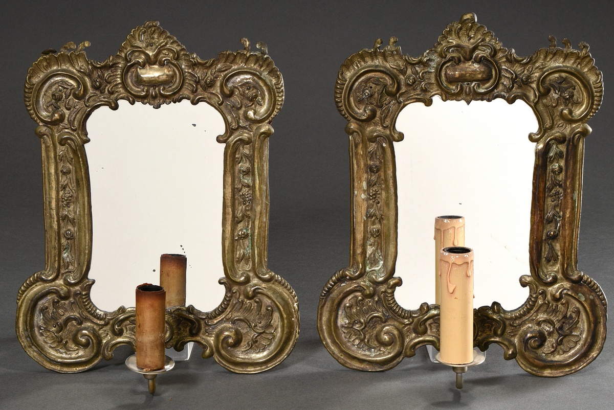 Pair of rococo mirror blazers in embossed tinplate frames with rocailles and C-sweeps, mid 18th cen