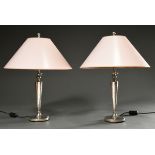 Pair of silver-plated English table lamps with floral engraved decoration, h. 55cm