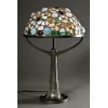 Art Nouveau table lamp with ornamental pewter base and leaded glass dome with polychrome flowers an