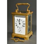 French travel alarm clock in all-round facet glassed and gilded brass case, enamelled dial with Rom