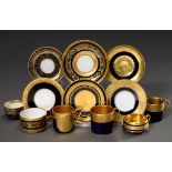 6 Various moch cups/saucers with different ornamental relief gold decorations on a cobalt blue back